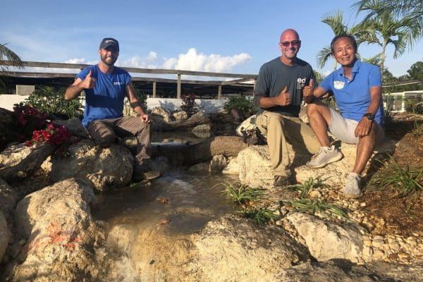 Jay Villemarette pictured with Aquascape’s Ed Beaulieu aka The Pond Professor and Ty Park, Founder of Iguanaland at a 2020 pond build in Punta Gorda Florida